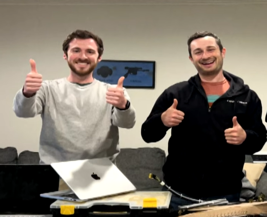 Cofounders os Senra Systems, Jordan Black and Benjamin Shanahan, with thumbs up