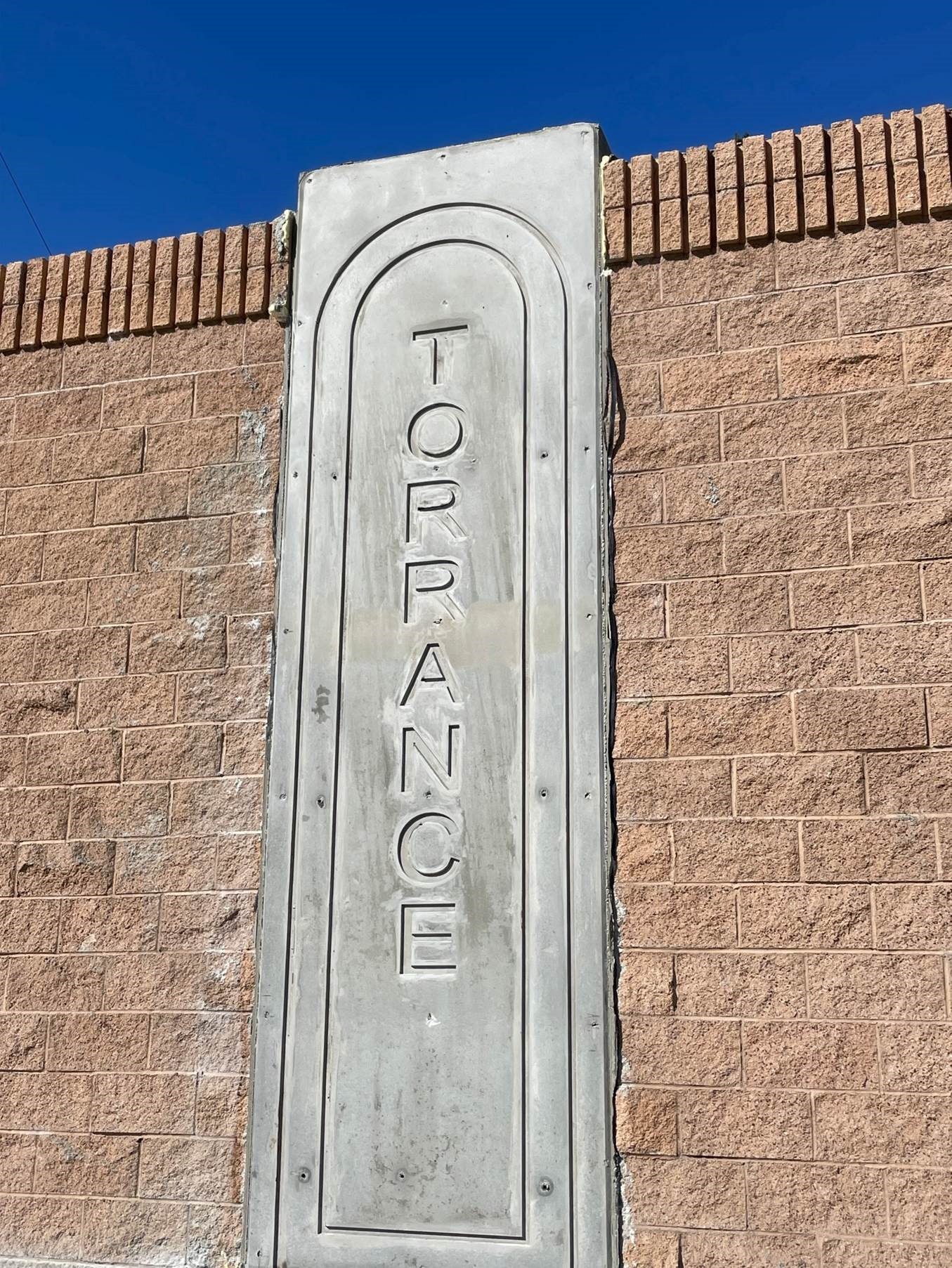 Image of a concrete slab that says Torrance